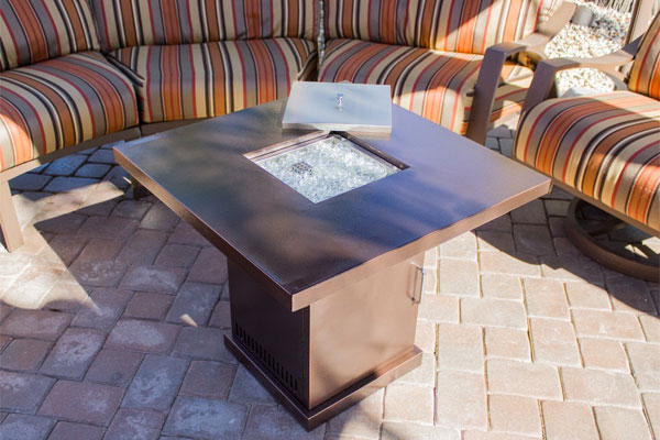 Hammered Bronze Fire Pit Table on Patio